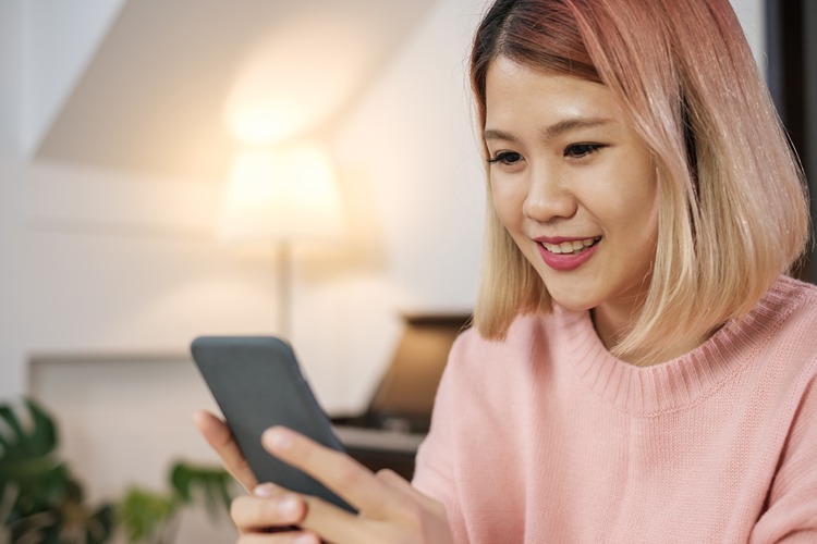 woman using mobile surfing internet and social media